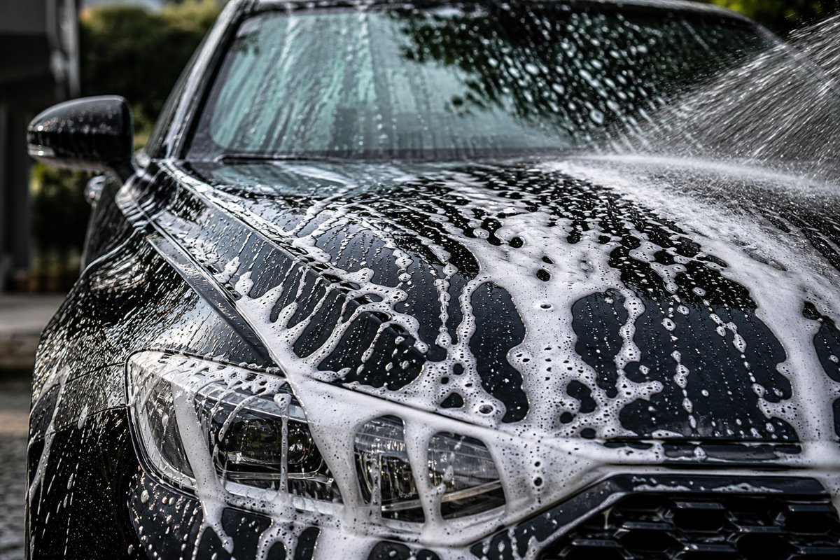 Foam exterior wash on a black vehicle